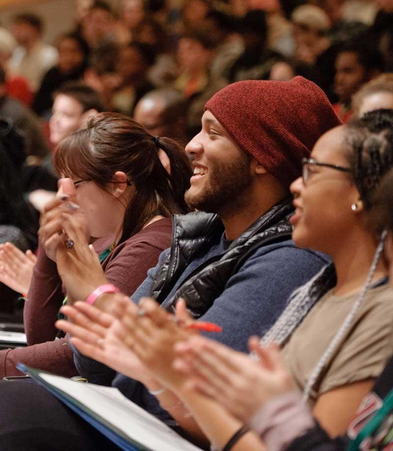 Students and staff enjoying auditorium lecture